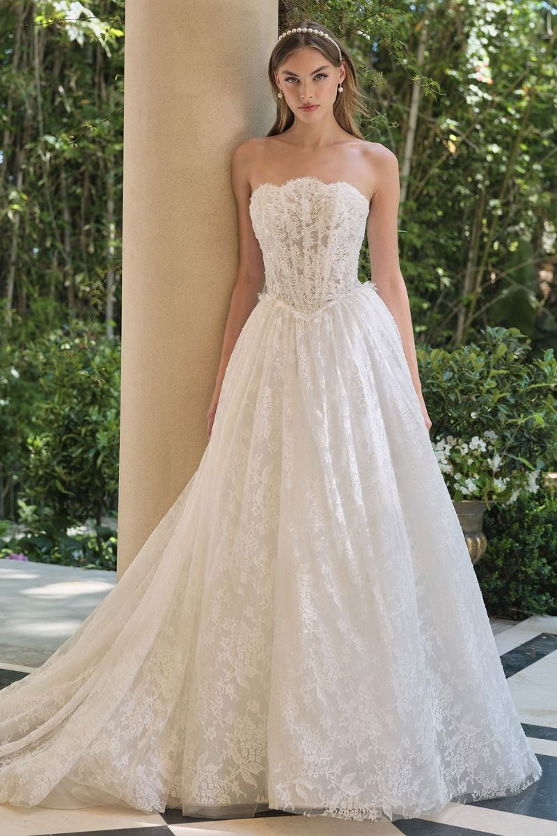 A-Line Wedding Gown With A Strapless Sweetheart Neckline And Intricately Embroidered Lace Bodice. 6 / Off White A-Line Wedding Gown With A Strapless Sweetheart Neckline And Intricately Embroidered Lace Bodice. 6 / Off White