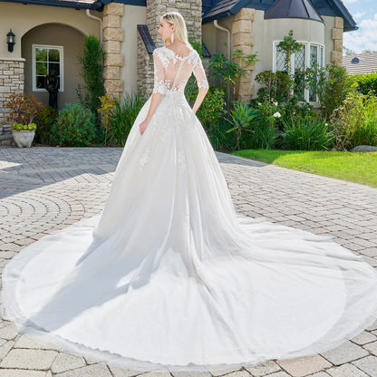 Wedding dress with V-neck, embroidered sparkly mesh and 1/2 sleeves