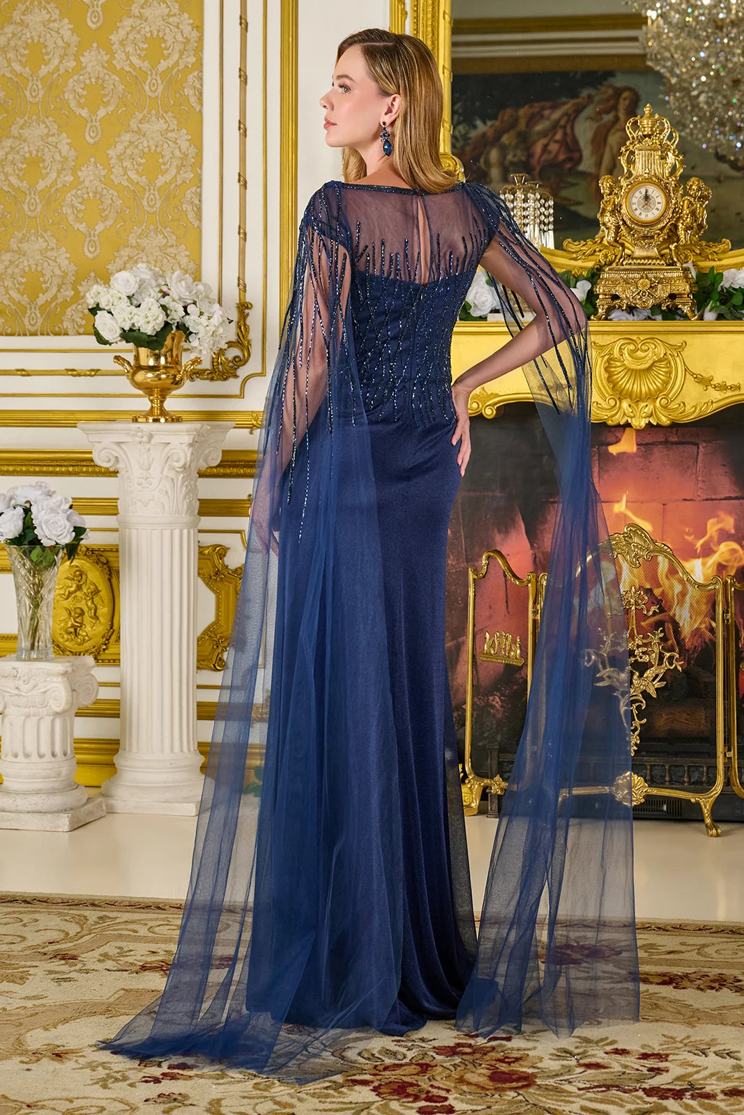 Bejeweled Boat Neckline Cape Sleeves Metallic Jersey Slit Skirt With Trailing Fabric