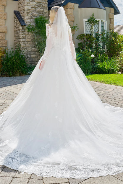 Wedding Dress Made Of Transparent Mesh, With Long Sleeves, A Round Neckline, And A Corset-Style Bodice.