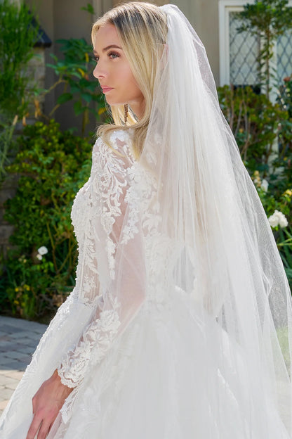 Wedding Dress Made Of Transparent Mesh, With Long Sleeves, A Round Neckline, And A Corset-Style Bodice.