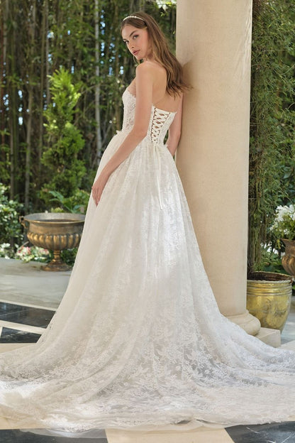 A-Line Wedding Gown With A Strapless Sweetheart Neckline And Intricately Embroidered Lace Bodice.
