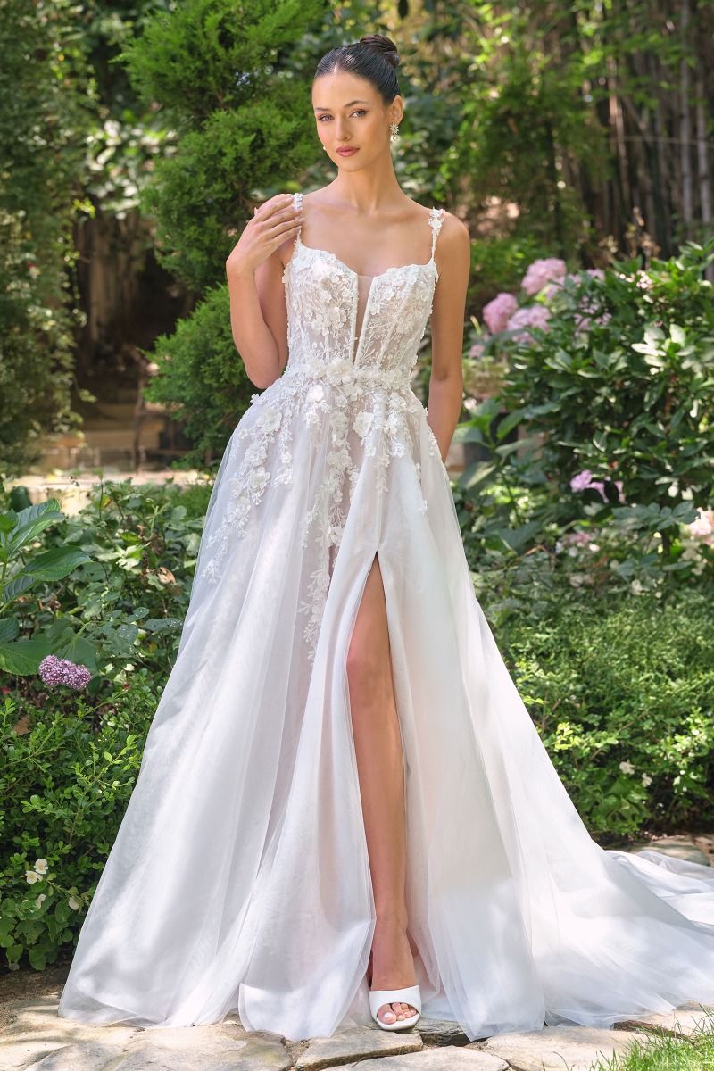 A-line wedding gown plunging illusion neckline and delicate floral straps corset bodice