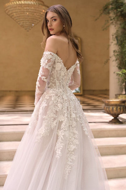 Off-The-Shoulder Neckline with Sheer Illusion Sleeves and A Corseted Bodice.
