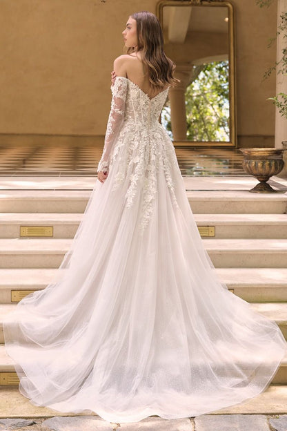 Off-The-Shoulder Neckline with Sheer Illusion Sleeves and A Corseted Bodice.